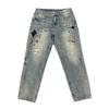 Jeans de Hombre de Denim Lavado y Rasgado con Parches y Bordados de Moda