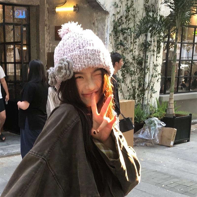 Korean atmosphere soft waxy coarse wool hat autumn and winter new crochet three-dimensional camellia knitted hat niche ear protection hat