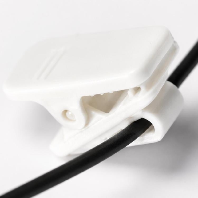 Spring Grip Thin Cord Fasteners with Separate Routing Guides for Earphone Cable Management Across Several Locations