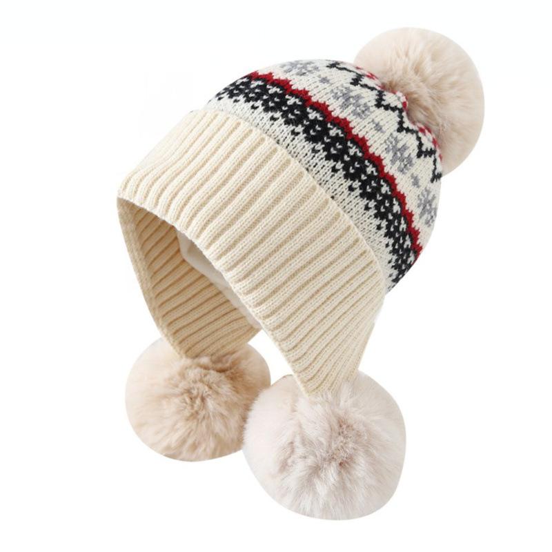 Autumn and winter jacquard knitted hat girls sweet hairball pullover hat piled and thickened Fair Island cold-proof ear protection wool hat