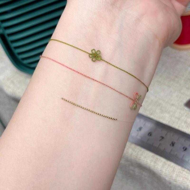 

Зеленая вишня Чрезвычайно тонкий мини браслет из цветущей сакуры ручной работы Плетеный вручную шнурок зеленого цвета года рождения Маленький свежий изысканный белый браслет White Moonlight White Hand Rope-Drawable