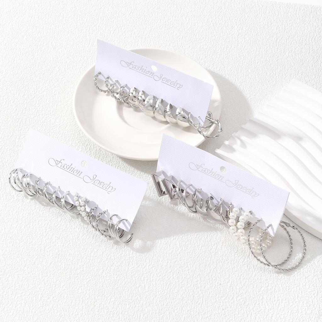 Punk Dicke Metall C-förmige Ohrringe Hip Hop Twist Muster Runde Imitations-Zirkon Creolen Damen Trendige Spicy Girl Zirkon