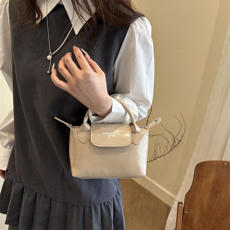 Spring and summer retro portable small square bag popular niche design women's bag versatile single shoulder diagonal span dumpling bag