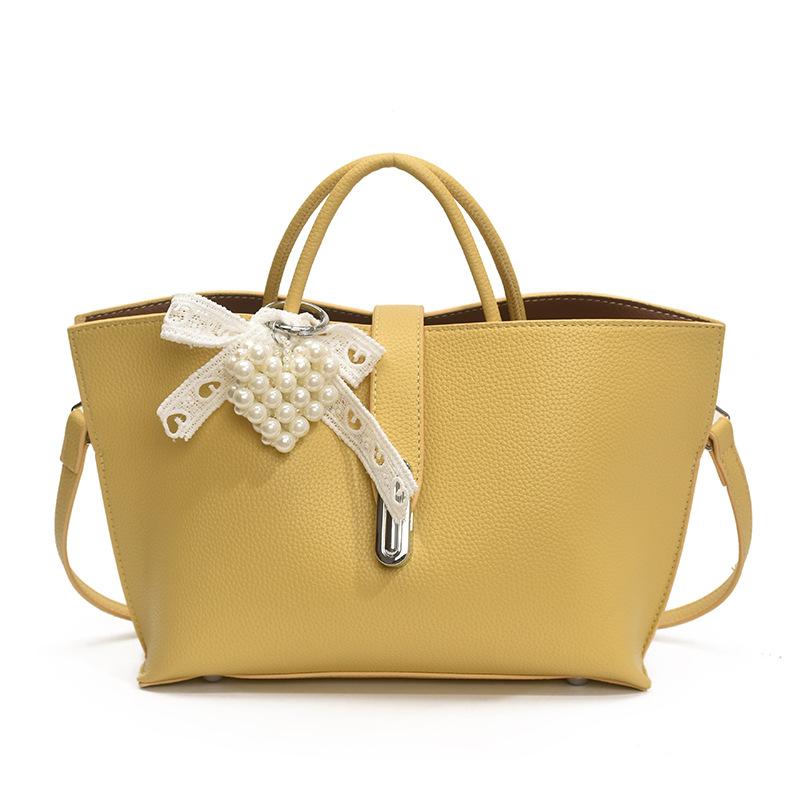 

Korean version niche handbag women s 2025 new fashionable and exquisite shoulder bag commuter versatile messenger bag Without pendant жёлтый