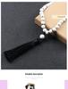 European 8mm Stone Bead Tassel Necklace and Multi-Strand Buddhist Bead Bracelet