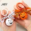 Hanging Bell Keychain Halloween Pumpkin Keychain, Hollow Head Key Ring Decorative with Ribbon Bow, Backpacks Charm for Holiday Party Decoration