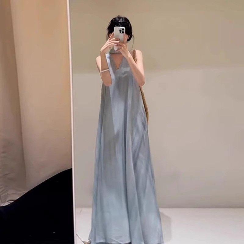 French high-end seaside vacation smudged V-neck suspender dress for women's summer is popular this year, long skirt