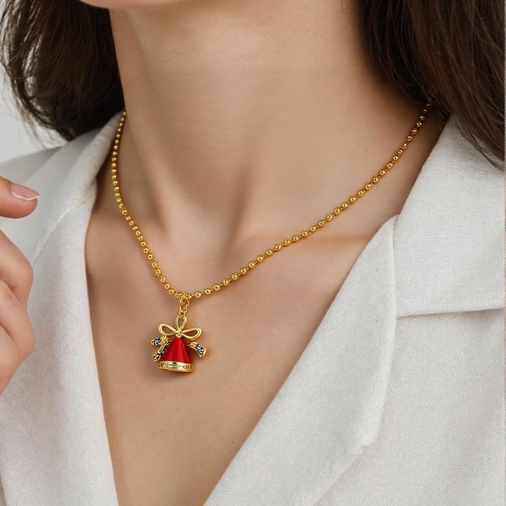 Weihnachtskollektion: Perlenkette mit Anhängern von Baum, Schneemann, Weihnachtsmann, Rentier, Kranz, Handschuhen und Socken