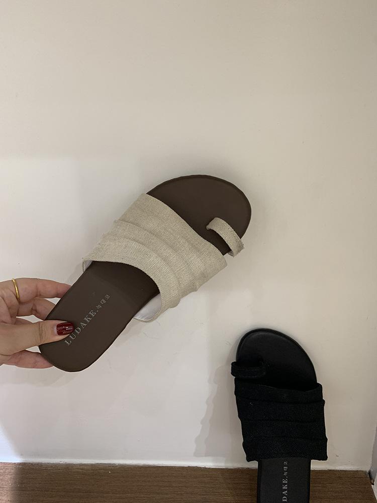 Fashion flat-bottomed pinch Roman slippers women's shoes wear summer cotton and linen sandals sandals design sense one-word slippers women