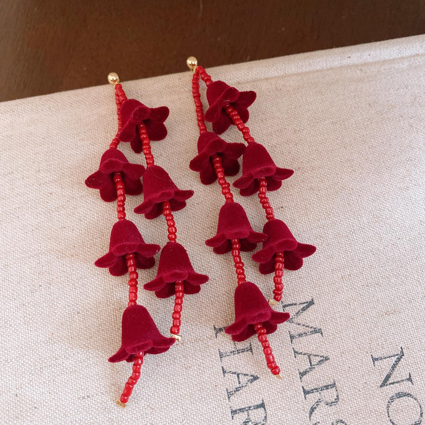 Silver needle glass beaded flocking flower fringed earrings temperament earrings design sense niche