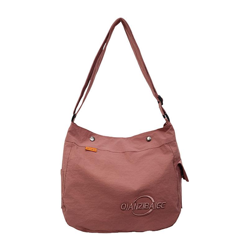 

Сумка-мессенджер на одно плечо, ленивый стиль, повседневная, универсальная, однотонная, холщовая сумка, простая, универсальная, большой вместимости, легкая сумка для поездок на работу розовый