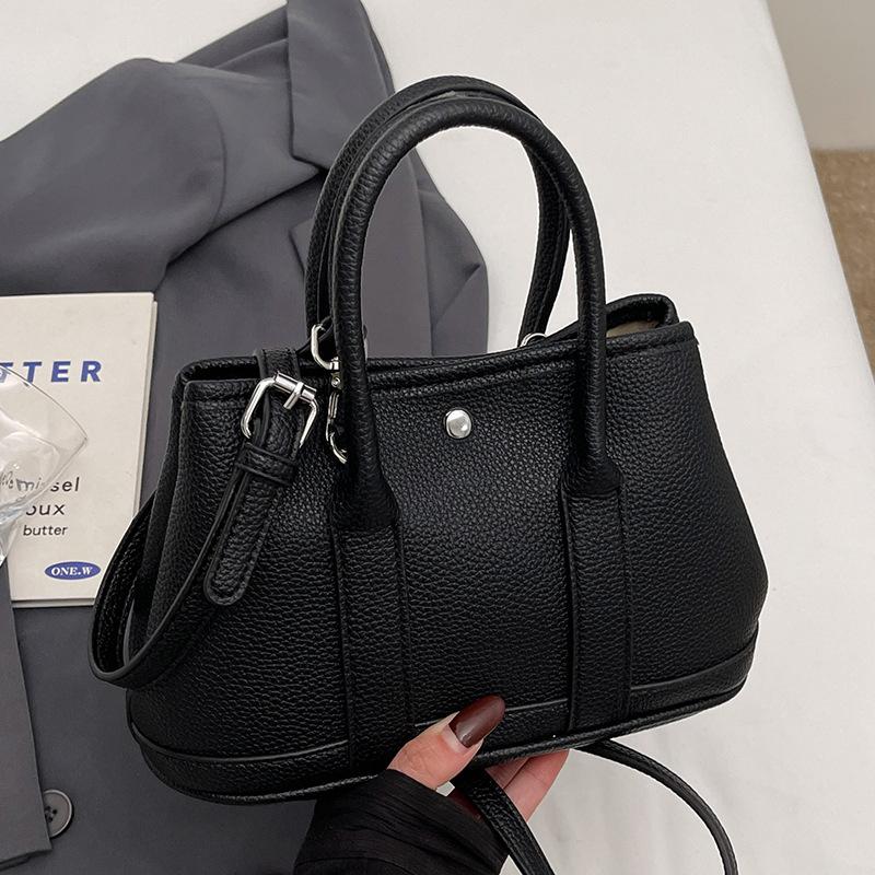 New Niche Simple Leisure Commuter Portable Bucket Bag Versatile Design Sense Solid Color Messenger Bag Women