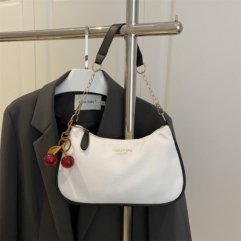 Fashion trend solid color underarm bag women's 2026 new shoulder handbag texture shoulder messenger bag handbag