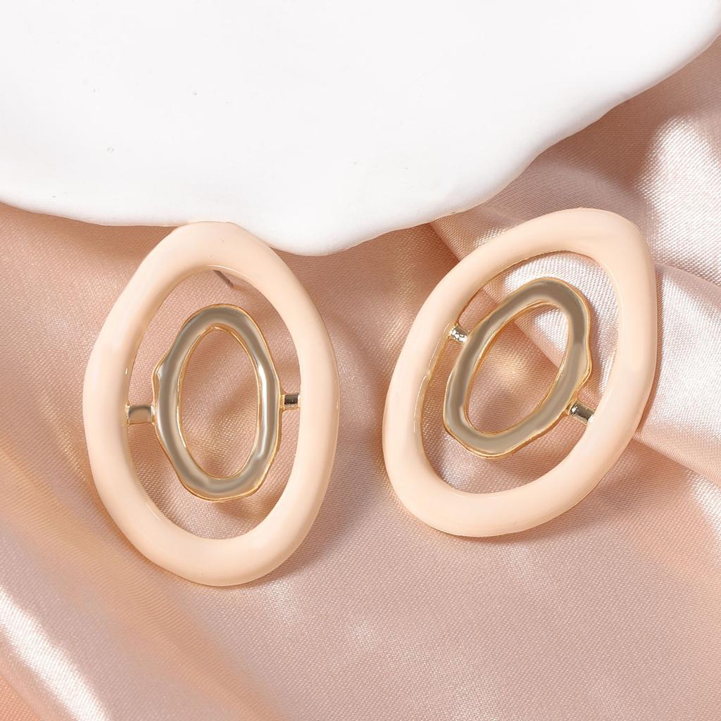 Korean version of dopamine color hollow geometric creative design sense round alloy stud earrings daily commuting