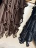 Designerkjol för dam, A-linjeformad, med volanger, i mesh, "tårta"-design - Fluffig, oregelbunden, medellång för vår/sommar