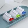 1 eenvoudige tube tandpastadispenser (willekeurige kleur)