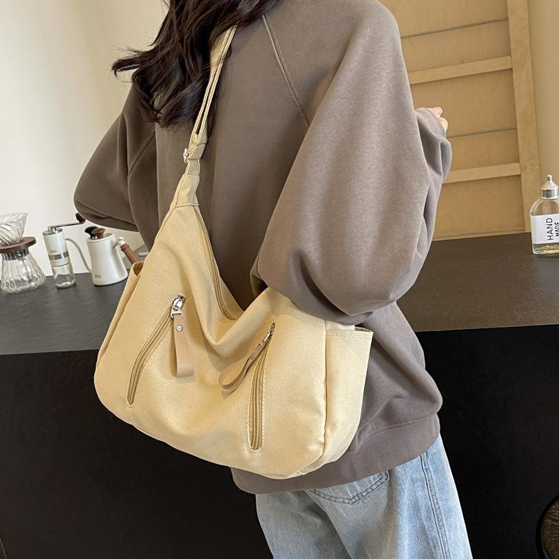 Simple Large Capacity Canvas Bag for Women New Casual Crossbody Dumpling Bag for College Students Fashionable One-shoulder Tote Bag