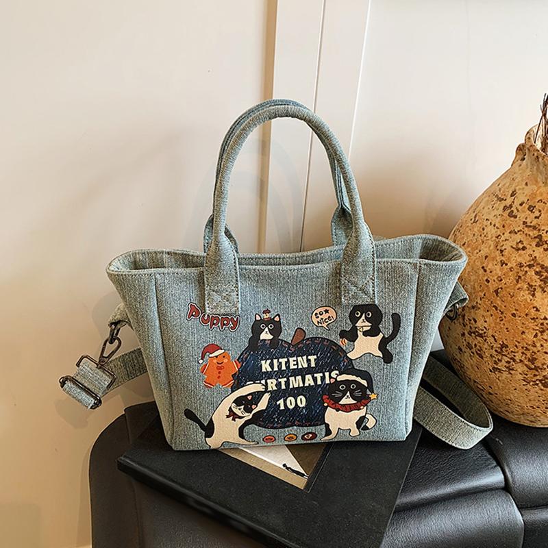 2025 New Trendy Cartoon Cat Print Denim Bucket Bag Versatile Casual Commuter Large Capacity Crossbody Shoulder Bag for Women
