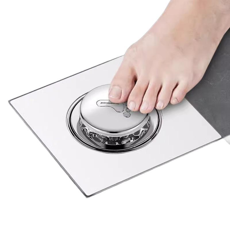 

Напольный слив для ванной комнаты Устройство против запаха с подпрыгивающим сердечником Тип ножной педали против нажатия для канализации