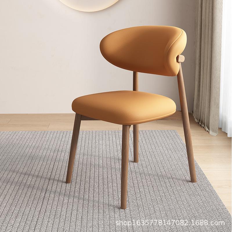 Nordic Modern Minimalist Solid Wood Dining Chair with Soft Pack Backrest - Comfortable Light Luxury Ram's Horn Design for Home, Restaurant, and Hotel.