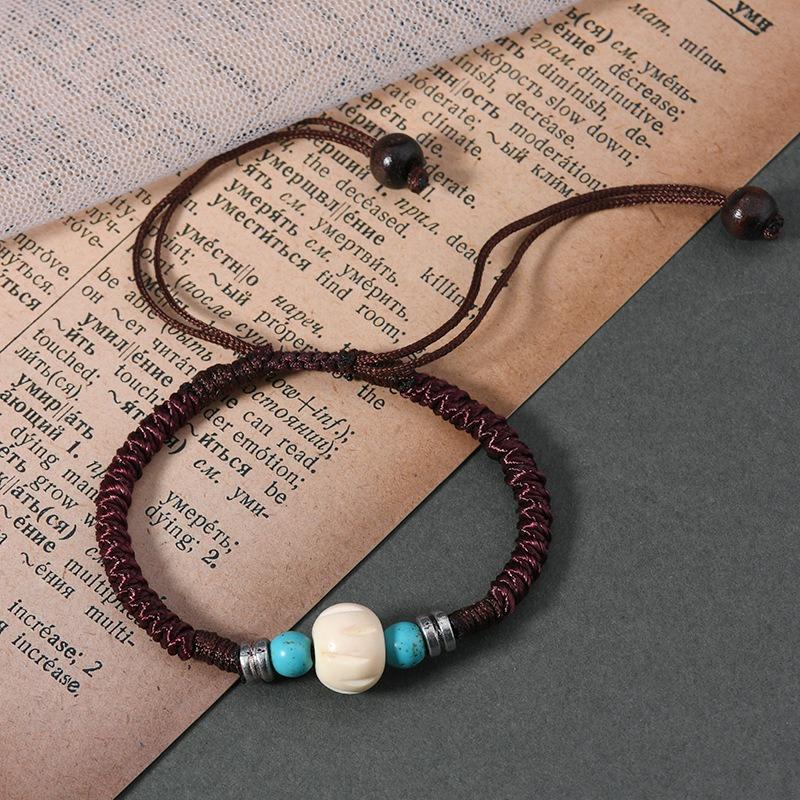 Retro Tibetan beef bone dog tooth bracelet engraving dzi bead yak bone personalized men's and women's hand rope scenic jewelry