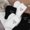 Damen Samtsocken Herbst und Winter Verdicken Thermo Herz Korallen Samt Schlaf Plüsch Boden Schwarz Weiß Socken Unterwäsche
