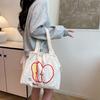 Apple's new drawstring canvas bag student light commuting versatile shoulder bag niche large capacity simple tote bag