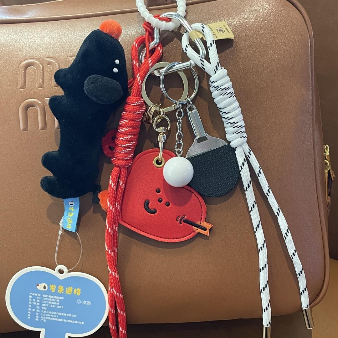 Clockwork puppy plush doll miu windbreaker bag ping pong car pendant cartoon access control cover keychain pendant чёрный