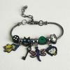 Anime Coraline die geheime Tür Armband Anhänger Coraline Emaille Anhänger Cosplay Geschenk für Männer Frauen Rucksack Schmuckzubehör