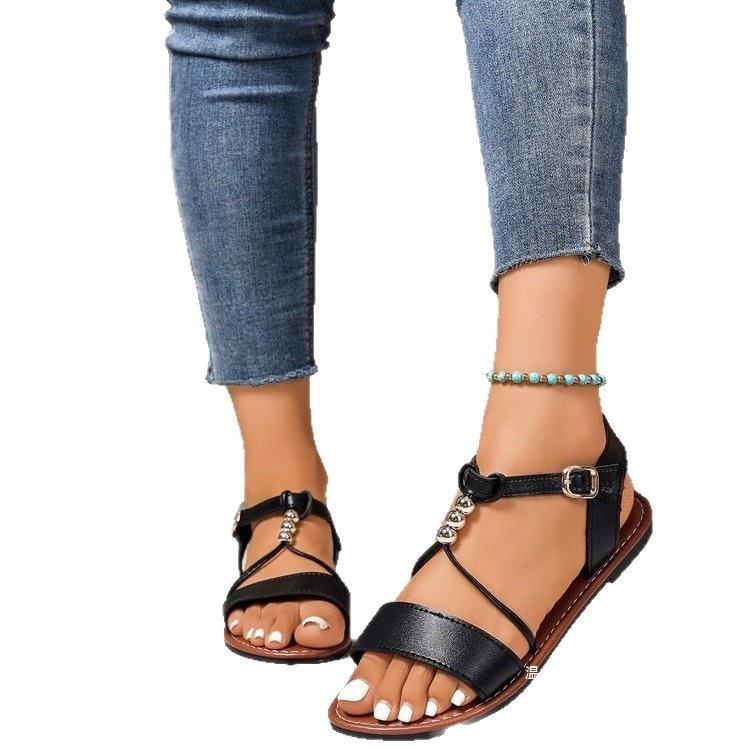 Foreign trade new large size beaded flat-bottomed casual sandals women's solid color one-word buckle with rhinestone beach cool slippers