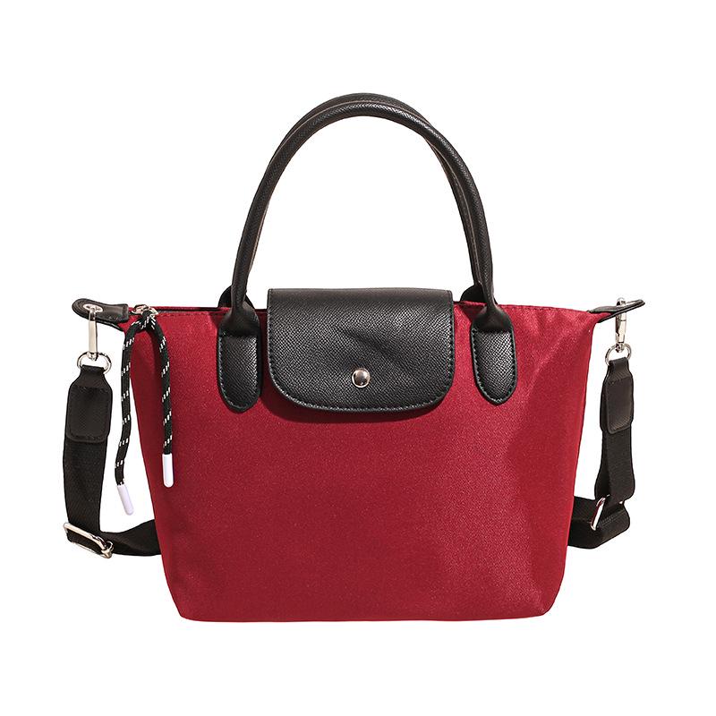 Minimalist Color-Block Oxford Cloth Handbag: Versatile, Fashionable Shoulder Bag with Unique Texture.
