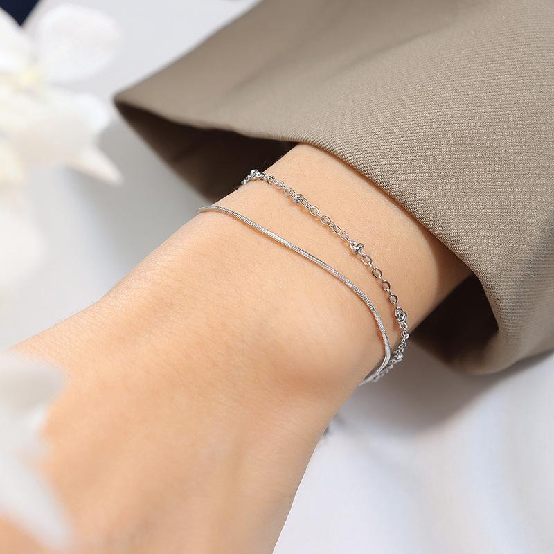 European & American Style Double Layer Snake Bone Chain Bracelet - Delicate Beaded Chain, Titanium Steel, Gold Plated, Hypoallergenic Jewelry