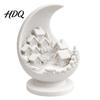 Study Room Desk Sculpture 3D Printed Crescent Moon and Snowy Village Figurine Mini House Statue Unique Resin Craft Ornament with Stable Base,