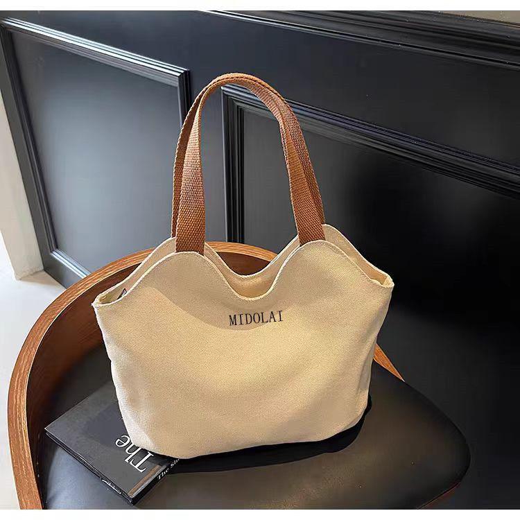 

2025 Exquisite Korean-Style Canvas Handbag: Versatile, Fashionable Commute Tote Without pendant