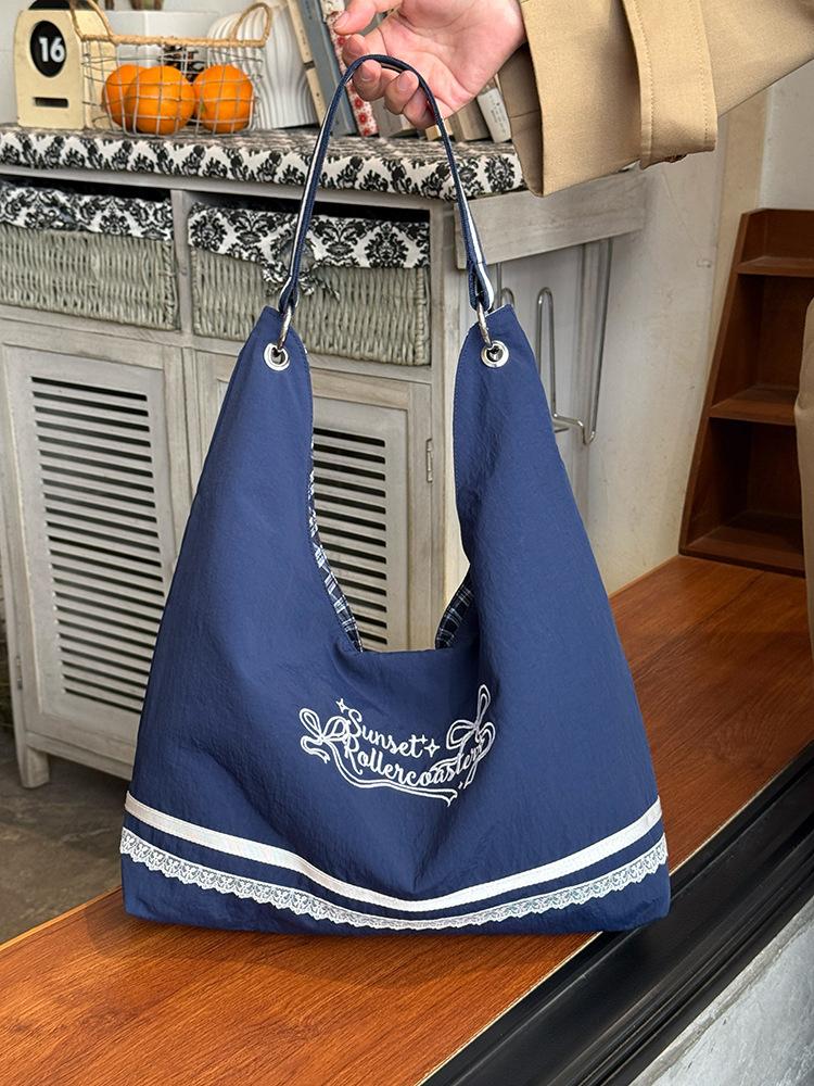 

Striped canvas bag women s summer 2025 new trendy Korean letter printing double-sided shoulder bag student class bag