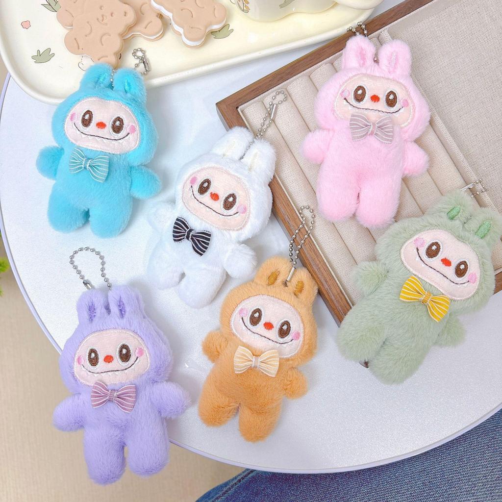 Adorable Labubu Plush Doll Keychain with Bow Accent: Cartoon Character Charm for Bags and Accessories