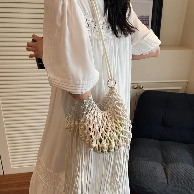 2025 Summer Hollow Out Shoulder Bags Weaving Beach Straw Bags Large Capacity Tassel Shoulder Crossbody Bags Vacation Handbags