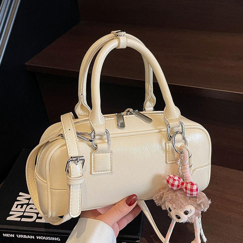 2025 Spring New Korean Version Simple Portable Bowling Bag Women's Versatile Foreign Style Commuter Premium Sense Messenger Bag