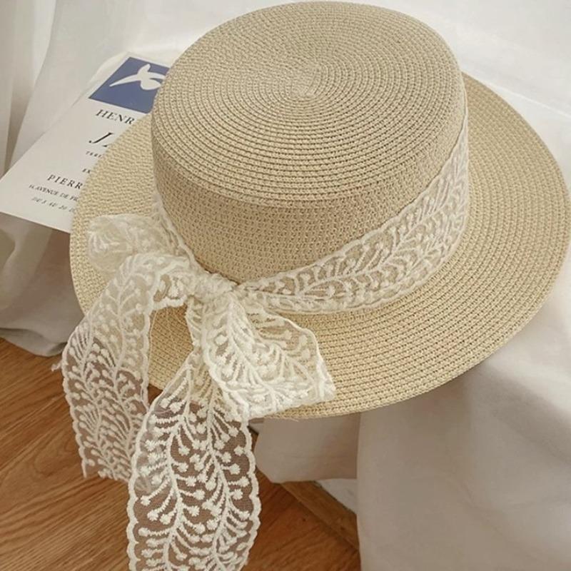 Flat top straw hat women's beach sunscreen bow top hat photo vacation straw weaving simple temperament sun hat