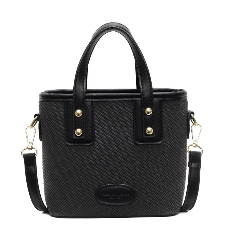 Spring new Korean version casual contrasting color fashionable portable bucket bag women's commuting versatile simple shoulder messenger bag