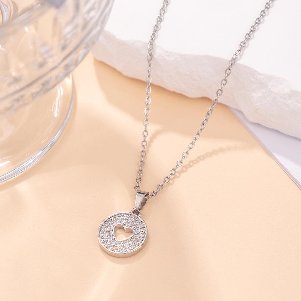 

Titanium Steel Howlite Inlaid Necklace – Elegant, Non-Fading Pendant