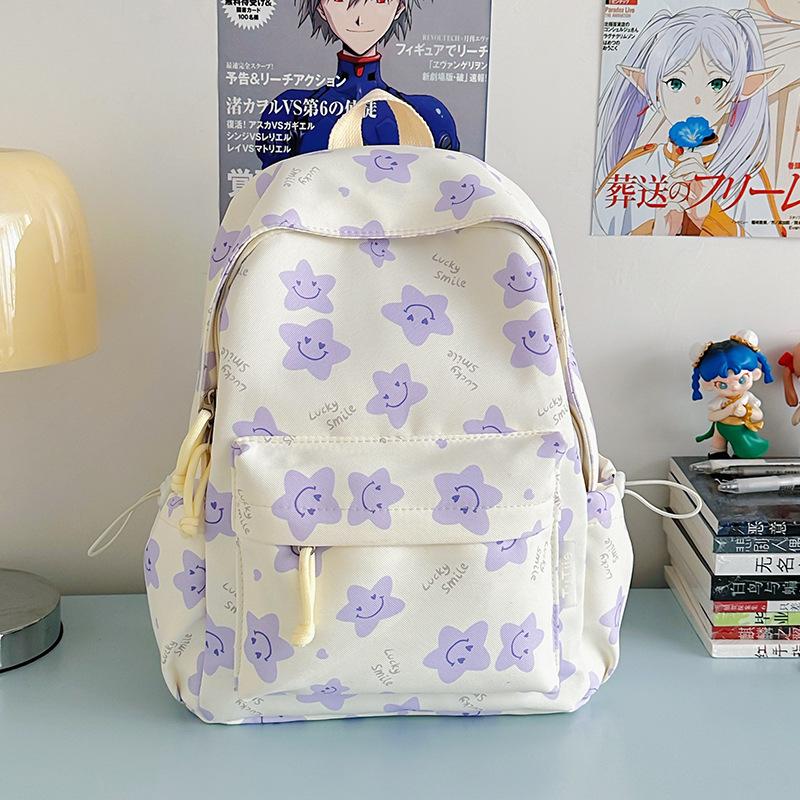 Nowy tornister jest wysokiej jakości, świeży, słodki i uroczy, a plecak w gwiazdki to lekki plecak podróżny dla uczniów gimnazjum.