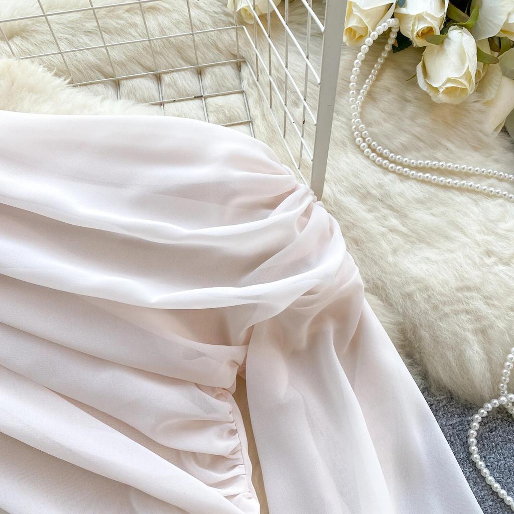 Nové jaro 2024 Elegantní tenká kancelářská halenka Ženy Šikmý límec mimo ramena Sexy topy Dámské Francie Jednobarevné módní design Šifonové topy