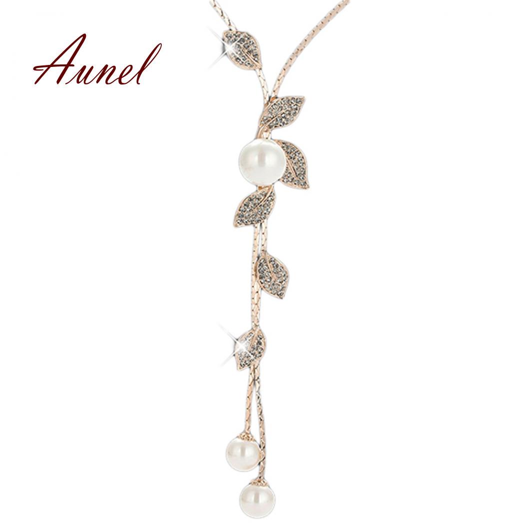 

Женская удлинённая подвеска в виде листьев золотистый