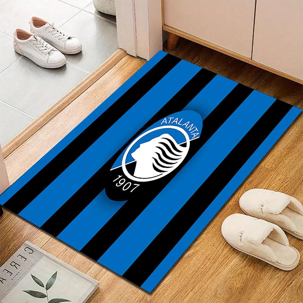 Atalanta Logo on Blue-Black Stripes Patterned carpet, suitable as a non slip play mat for the living room and bedroom sofa