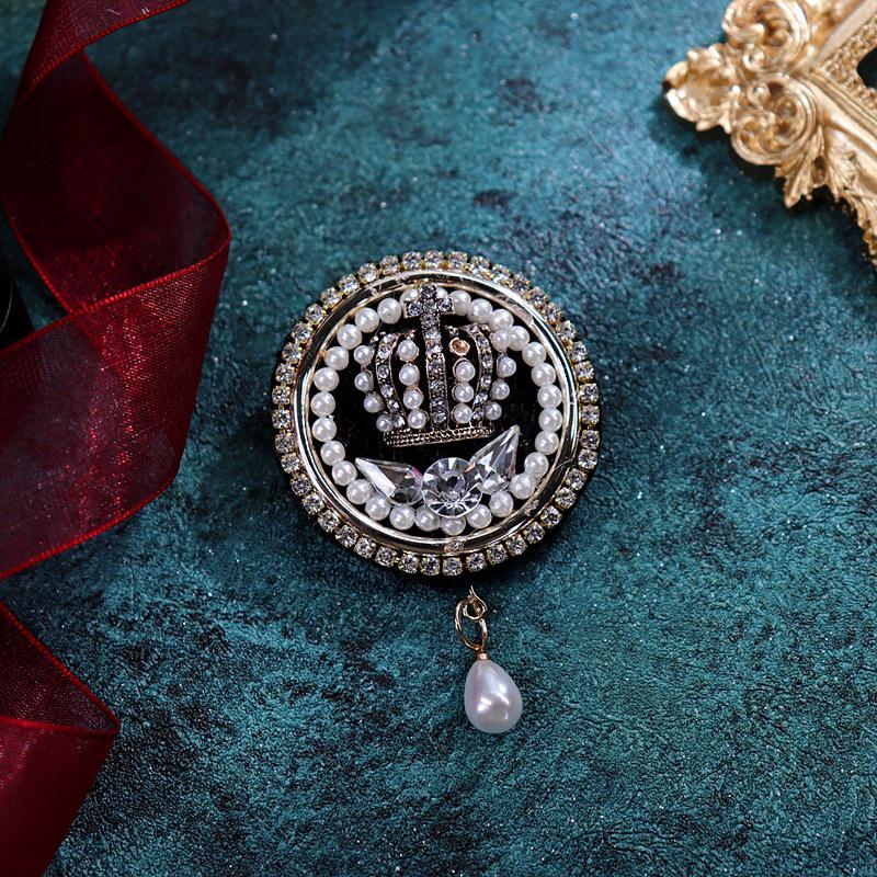 

Вінтажна британська барокова брошка з китицями для жінок