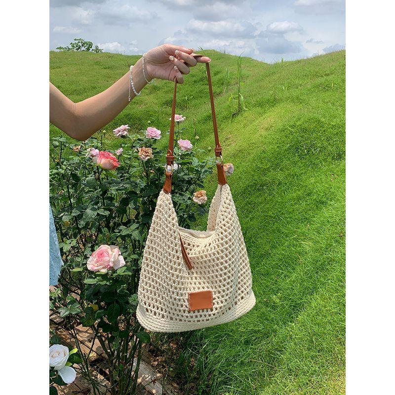 

Woven Hollow Bag Women 2025 New Summer Seaside Vacation Travel Tote Bag Beach Bag Shoulder Underarm Bag Beige