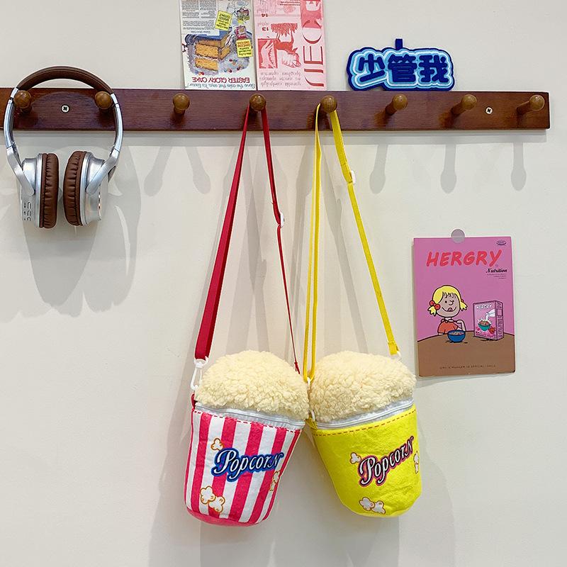 Cute plush bucket bag autumn and winter new girl shoulder messenger women's bag mobile phone makeup storage bag