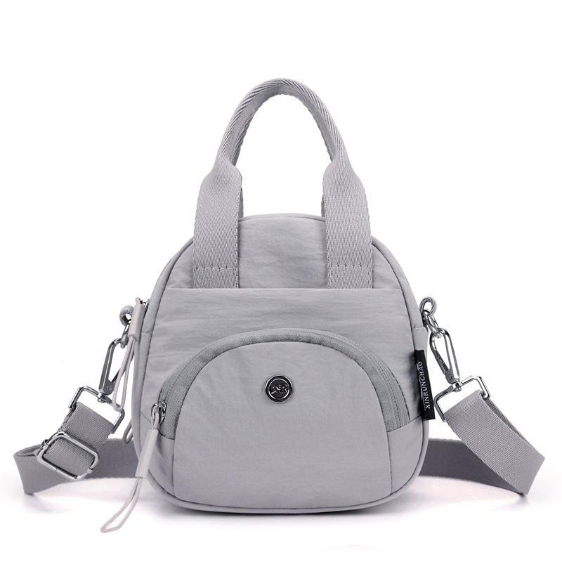 Neue einfache Handtasche lässige Schulter Messenger Bag Mama Einkaufen Handy Wechselgeldtasche große Kapazität Damentasche