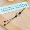 Four-Leaf Clover White Shell Fan Charm: Ancient-Style Phone Chain, Bag Pendant & Lanyard for Shoes, Clothing, and Phone Cases